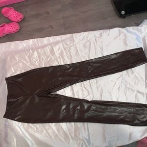 Brown faux leather pants.